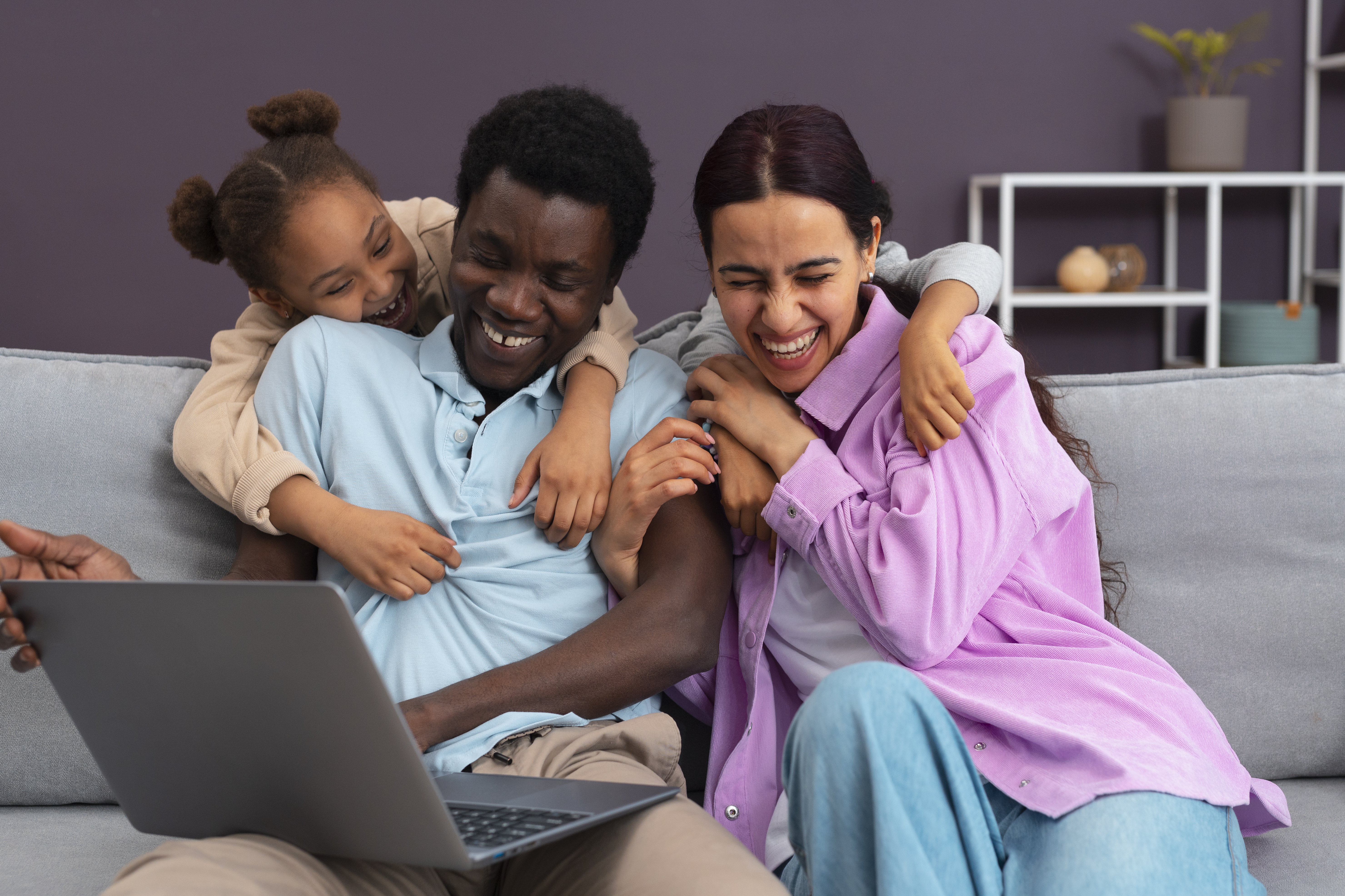 Happy family using high-speed internet at home